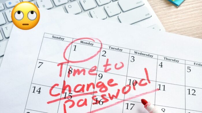 printed calendar page laying over a keyboard with the words "time to change password" written on it in red. eye roll emoji in the top left corner of the image.