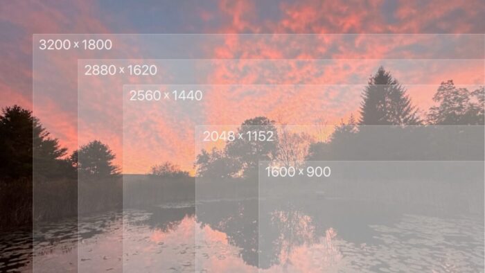 Picture of a cloudy sunset behind trees. There is a body of water in the foreground that is reflecting the trees. The sky is a medium blue and the clouds are pink and orange. The trees and reflection are mostly black. Overlaid on top of this photo are five transparent, overlapping rectangles of different sizes, all starting in the lower right corner and stretching up to the upper left. From top left to lower right, the text on each rectangle indicates a different screen resolution. Those resolutions are 3200x1800, 2880x1620, 2560x1440, 2048x1152, and 1600x900.