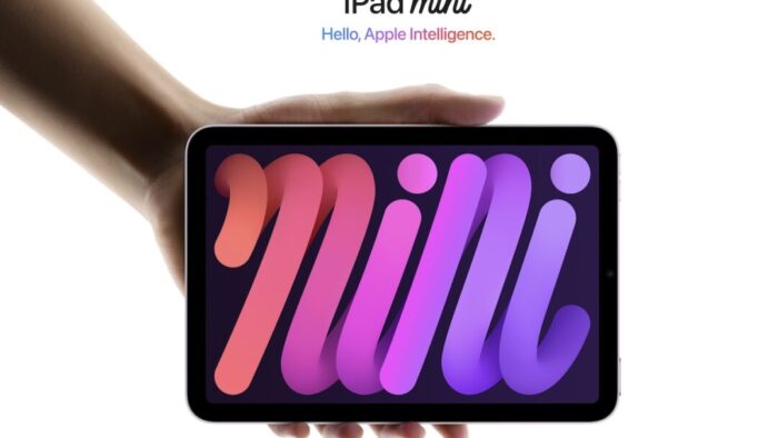 screenshot of an Apple ad for iPad mini. a hand stretches down from the top left corner holding an iPad mini that says "mini" in orange, pink, and purple. Text above the iPad reads "iPad mini. Hello, Apple Intelligence."