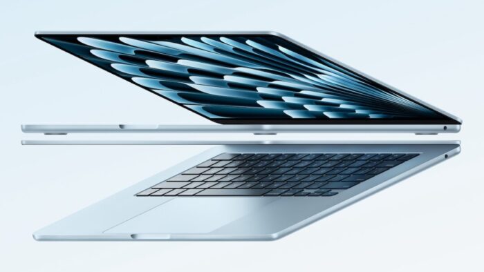 Apple stock photo of two sky blue MacBook Airs, both slightly open, one on top of the other.