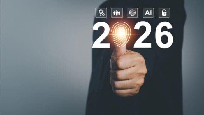 white background with the shape of a person whose hand is outstretched with a thumbs up. the thumbs is the zero in 2026.