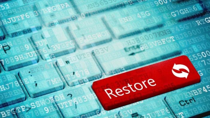 AI-generated image of a keyboard with a big red Restore button on it