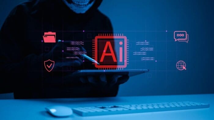 AI-generated photo of a skeleton in a cloak holding an iPad and Apple Pencil. On the desk in from, there is a keyboard and mouse. superimposed text in red reads "Ai"